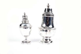 A George V silver sugar caster; and an Edwardian silver pepper shaker
