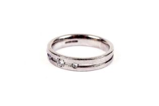 A diamond and 18ct white gold wedding band