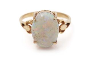 An opal cabochon dress ring