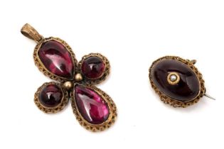 A 19th Century garnet and gold cross pattern pendant and a brooch