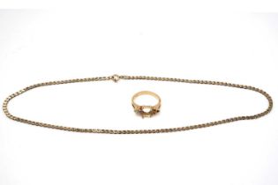 An 18ct yellow gold ring and a necklace