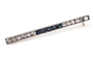 A white sapphire and sapphire bar brooch