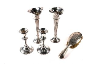 Silver items, including vases and candlesticks