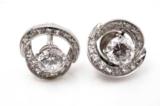 A pair of white stone and diamond earrings