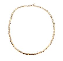 A yellow and white gold fancy link chain necklace