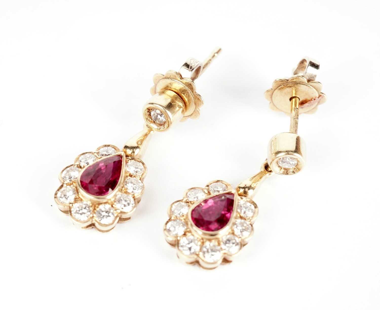 A pair of ruby and diamond drop earrings