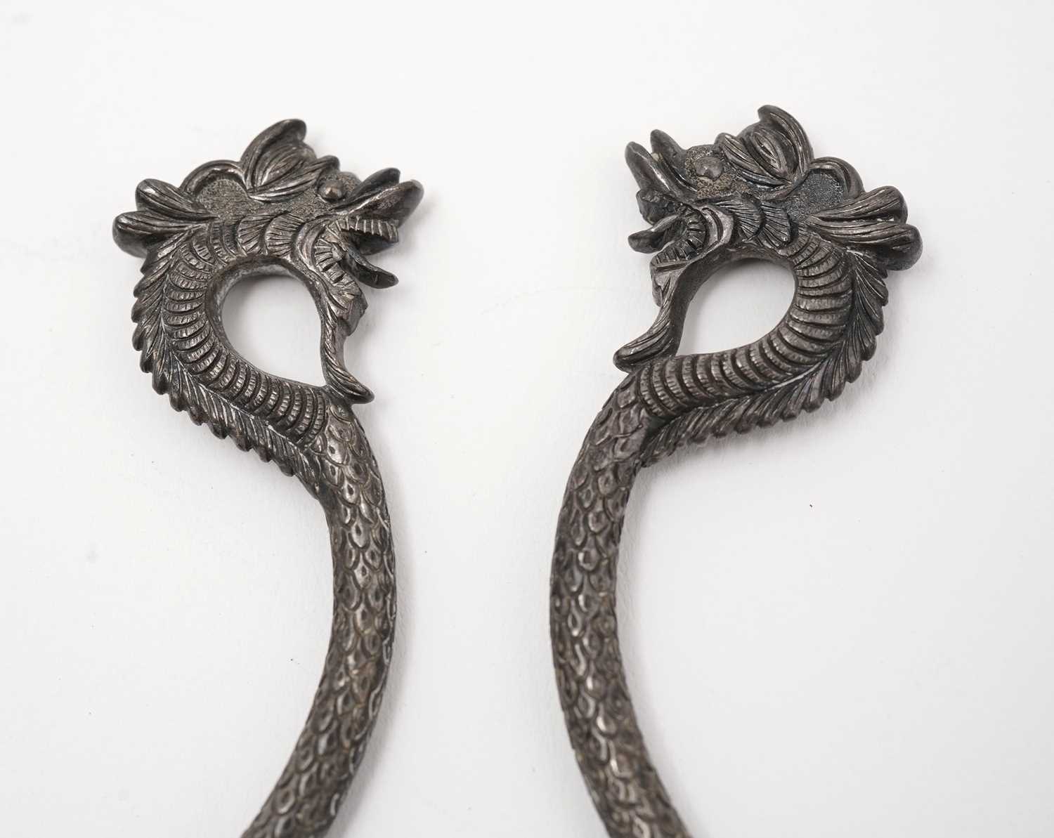 A pair of eastern silver decorative hooks - Image 6 of 8