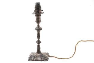 An early 20th Century silver candlestick lamp