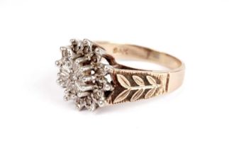 A diamond cluster dress ring