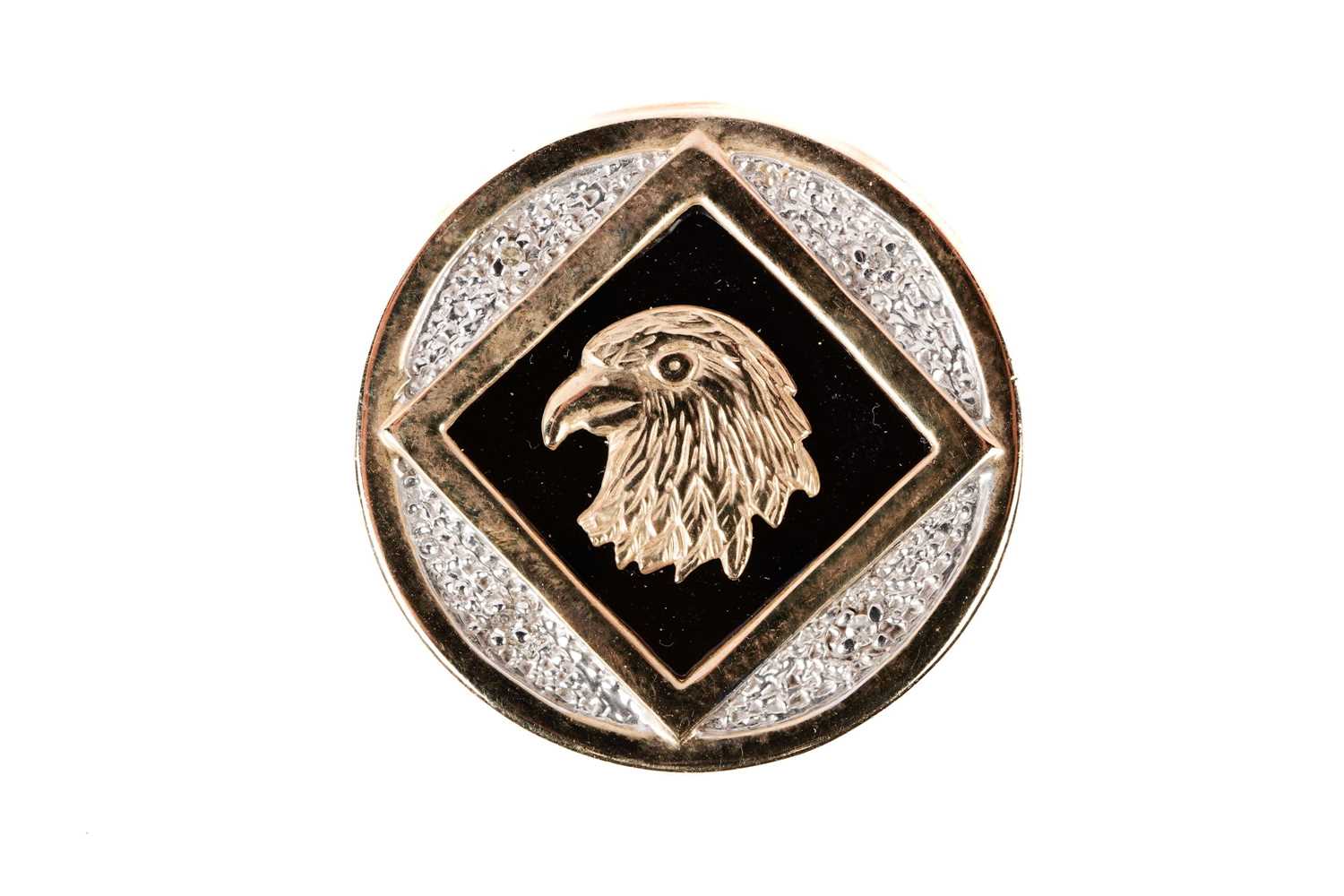 A diamond and enamel eagle signet ring
