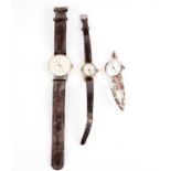 A 9ct rose gold manual wind wristwatch; and two other watches