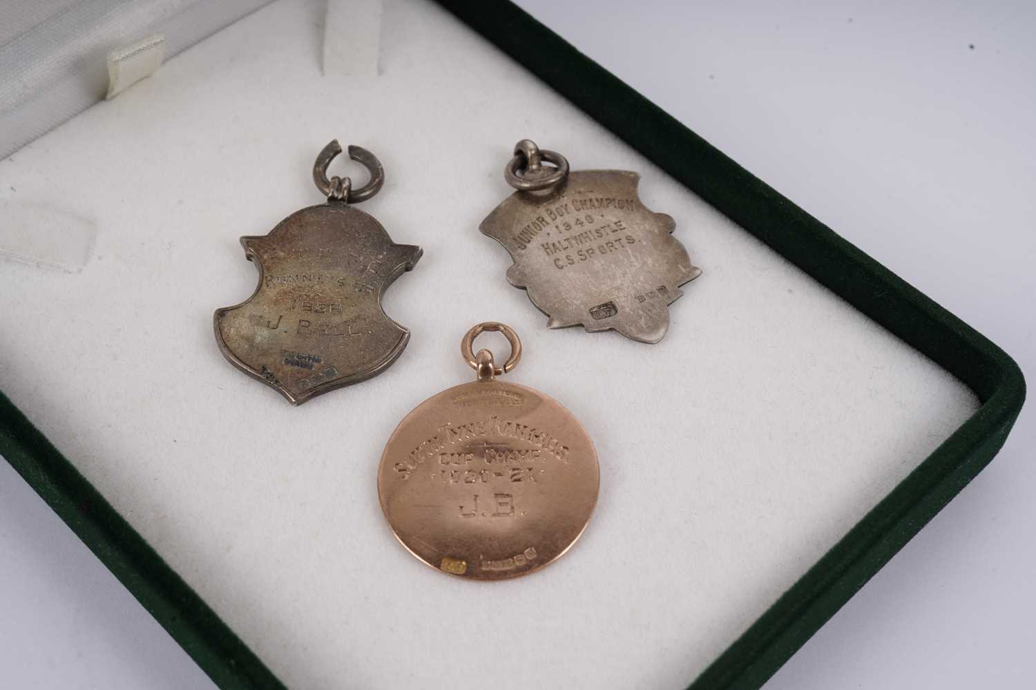 Two 1920s football medals; and another silver sporting medal - Image 3 of 5