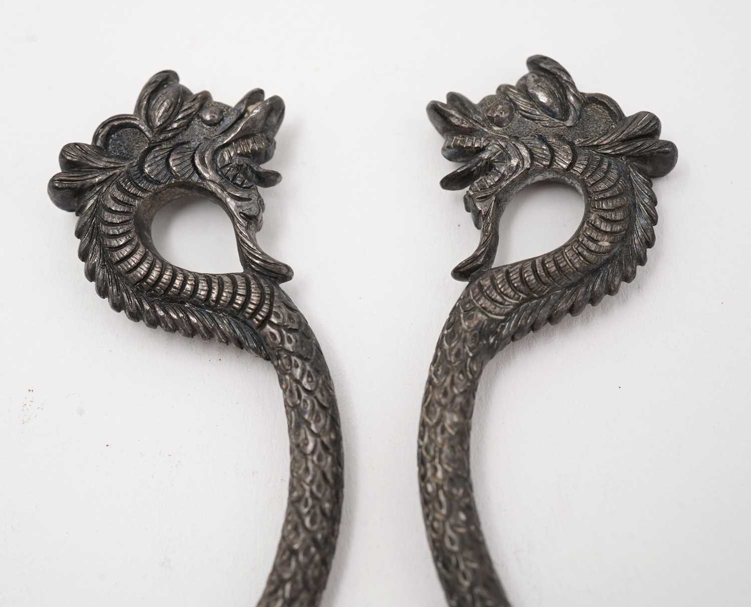 A pair of eastern silver decorative hooks - Image 2 of 8