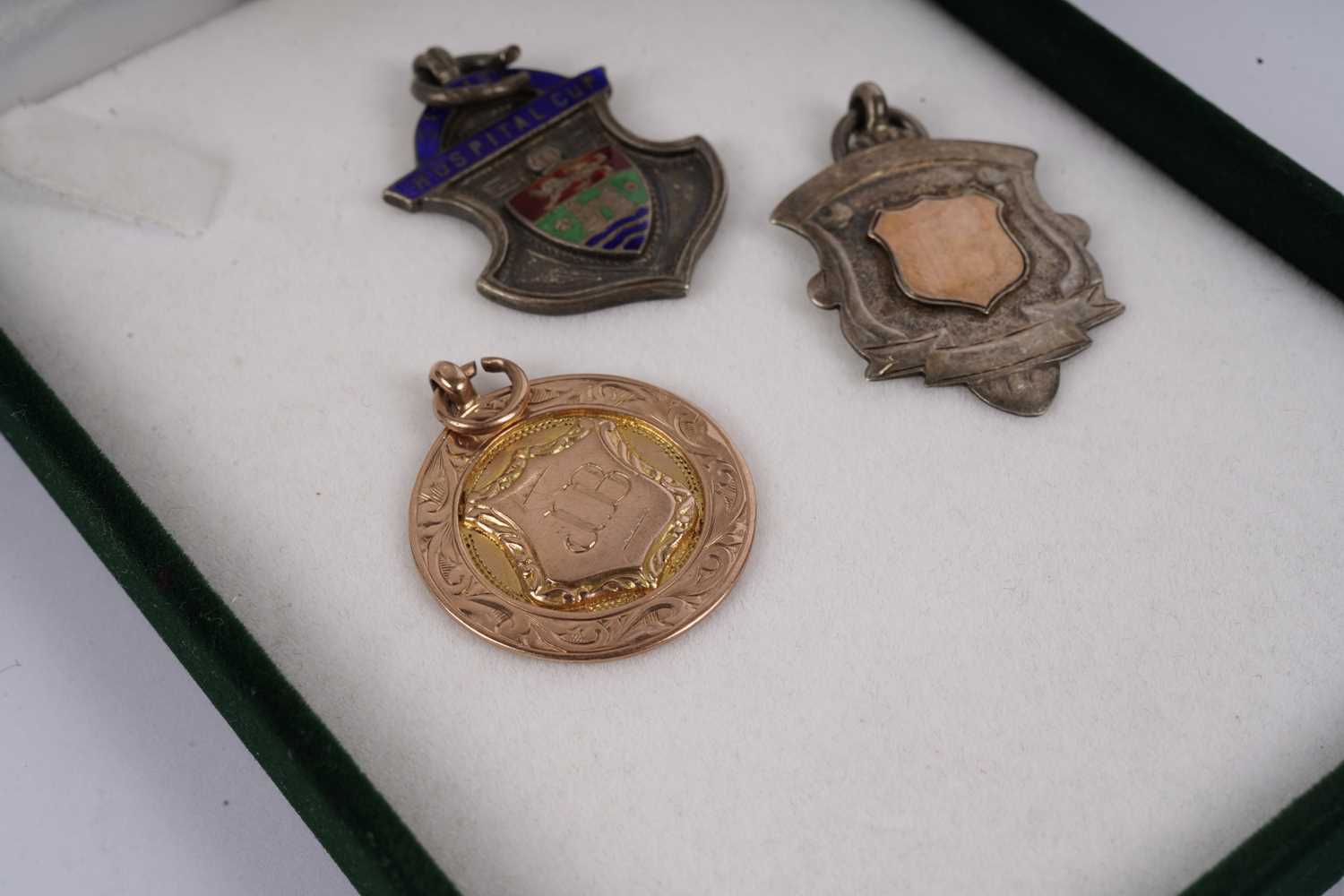 Two 1920s football medals; and another silver sporting medal - Image 2 of 5