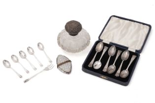 A selection of silver spoons; and two scent bottles
