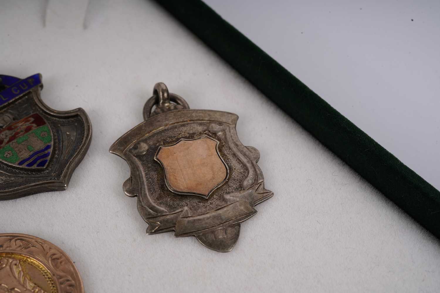 Two 1920s football medals; and another silver sporting medal - Image 5 of 5