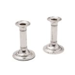 A pair of silver candlesticks