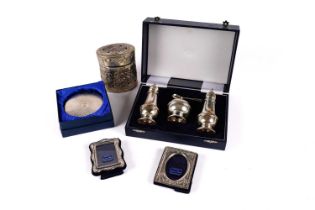 A silver cruet set, and others