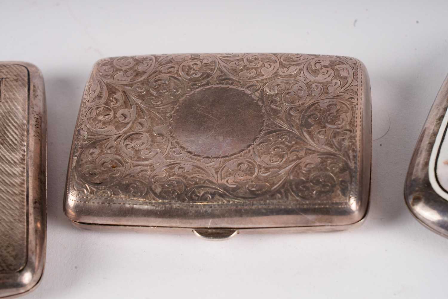 Two silver cigarette cases; an enamelled cigarette case; and a vesta case - Image 2 of 5