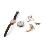A Delphi wristwatch; a silver compact; and a selection of costume jewellery