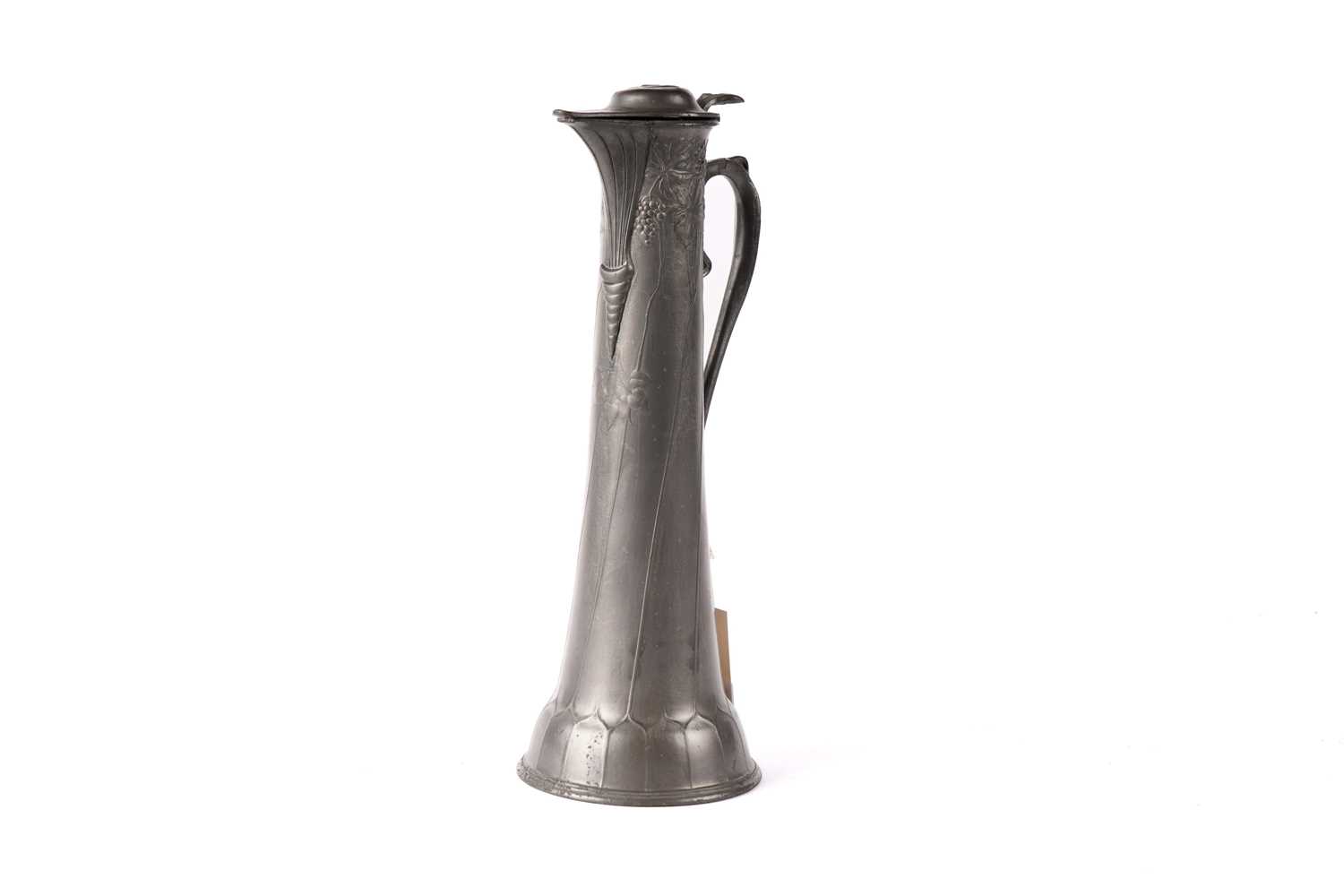 An Art Nouveau pewter claret jug