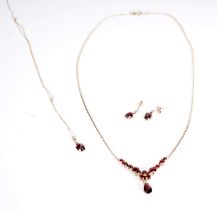 A garnet necklace, pendant and earrings