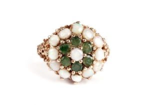 An opal and emerald cluster dress ring