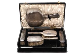 A George V silver dressing table set