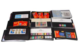 A collection of Queen Elizabeth II unused definitive and commemorative stamps