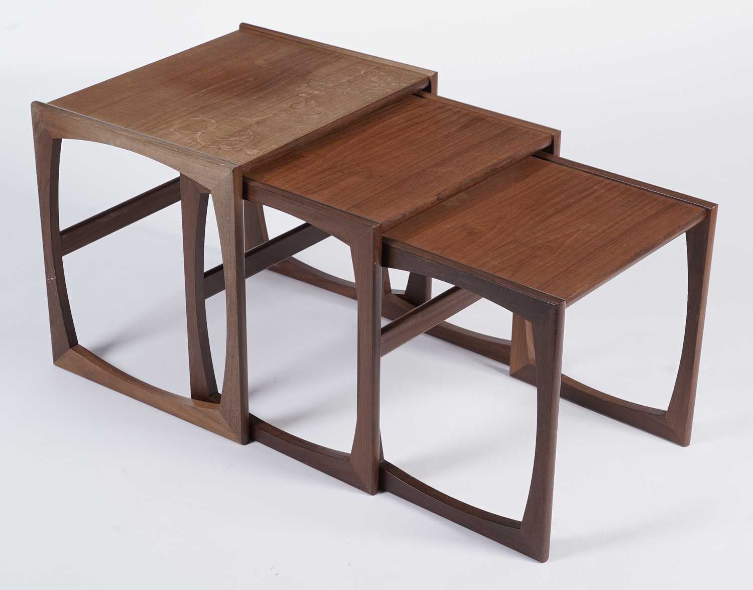 Victor B. Wilkins for G-Plan:: A nest of three teak 'quadrille' occasional tables
