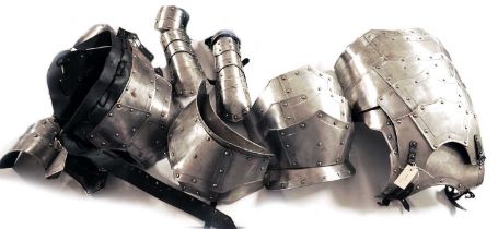 An articulated and rivetted suit of armour