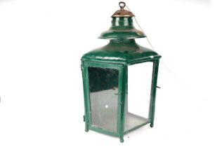 A vintage green painted brass gas lantern