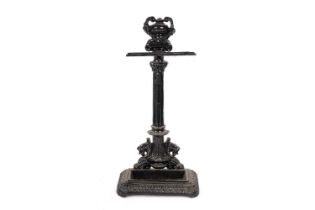 A Victorian black painted cast metal umbrella or stick stand