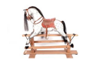 A Victorian style dapple-grey rocking horse