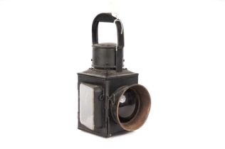 A black painted cast metal railway lantern