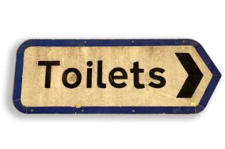 A metal Toilets road sign