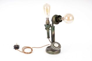 A kitsch green and gilt painted vintage telephone, converted into a table lamp