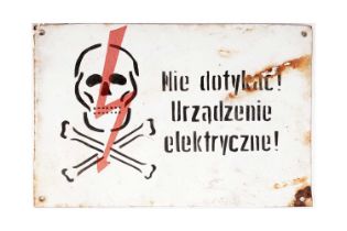 A Polish enamel danger sign