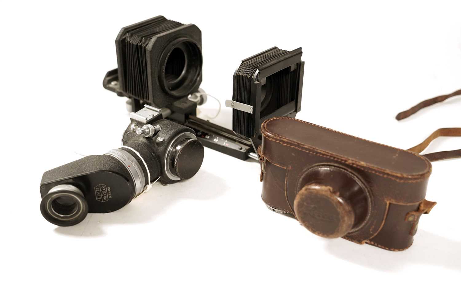 A Leica IIIc rangefinder camera, and other Leica/Leitz accessories