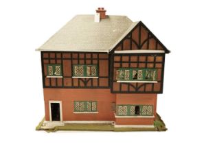 A vintage Tudor style two-storey dolls house