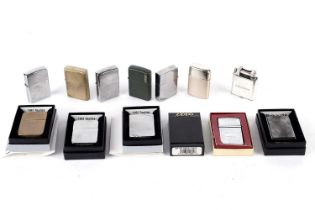 A collection of Zippo and other cigarette lighters