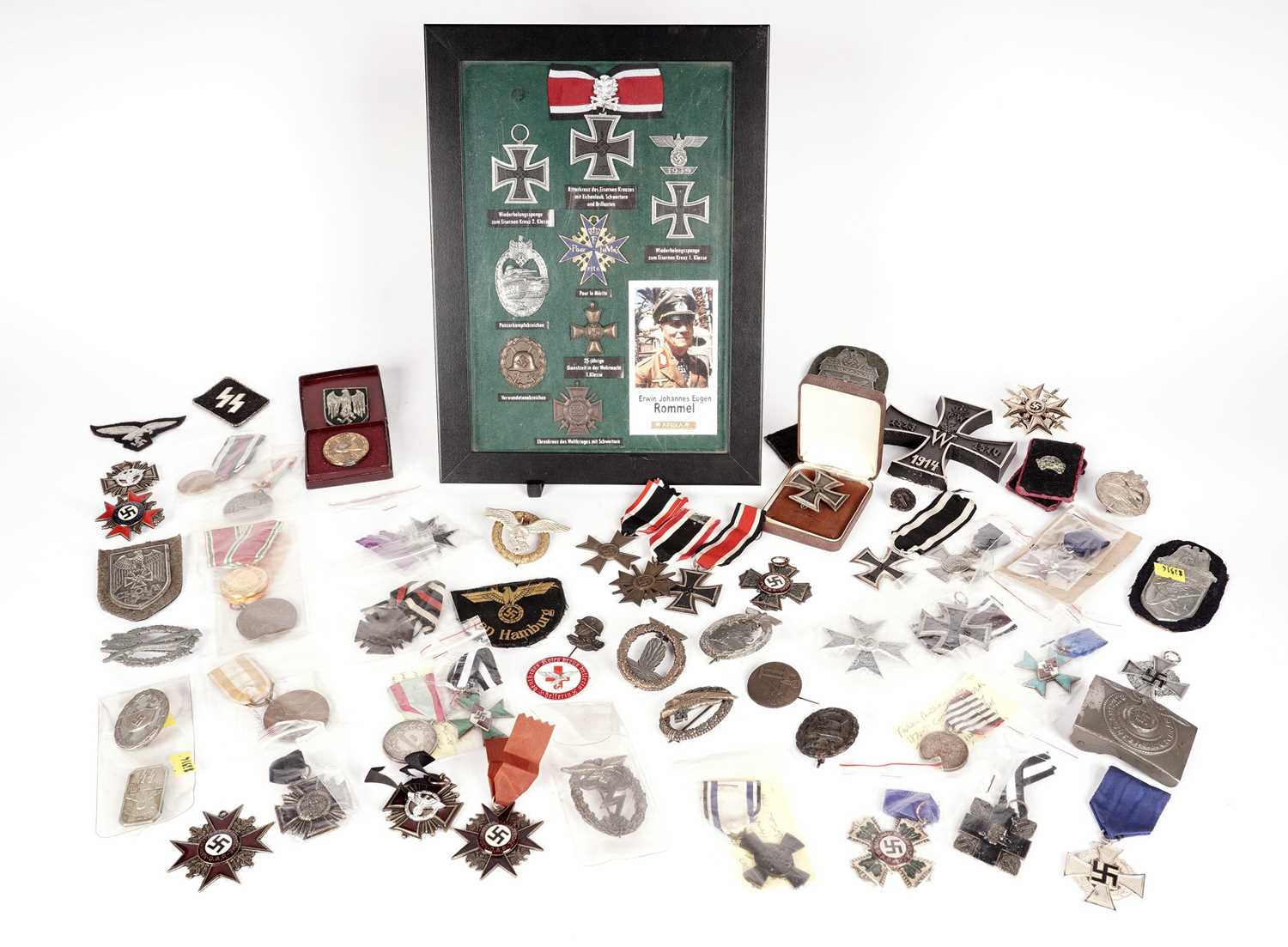 A collection of German WWII style replica military items