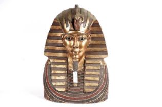 A large decorative Mask of Tutankhamun
