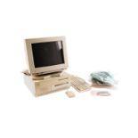 An Apple Macintosh computer, monitor and accessories