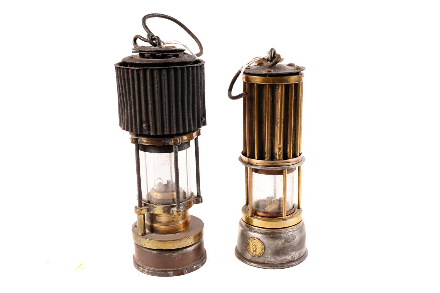 Two miners safety lamps