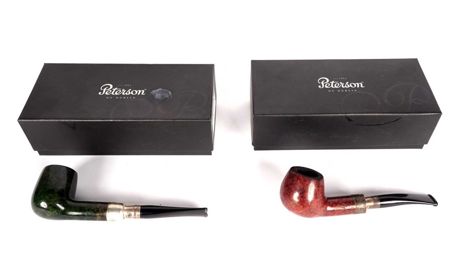 Two Petersons tobacco pipes