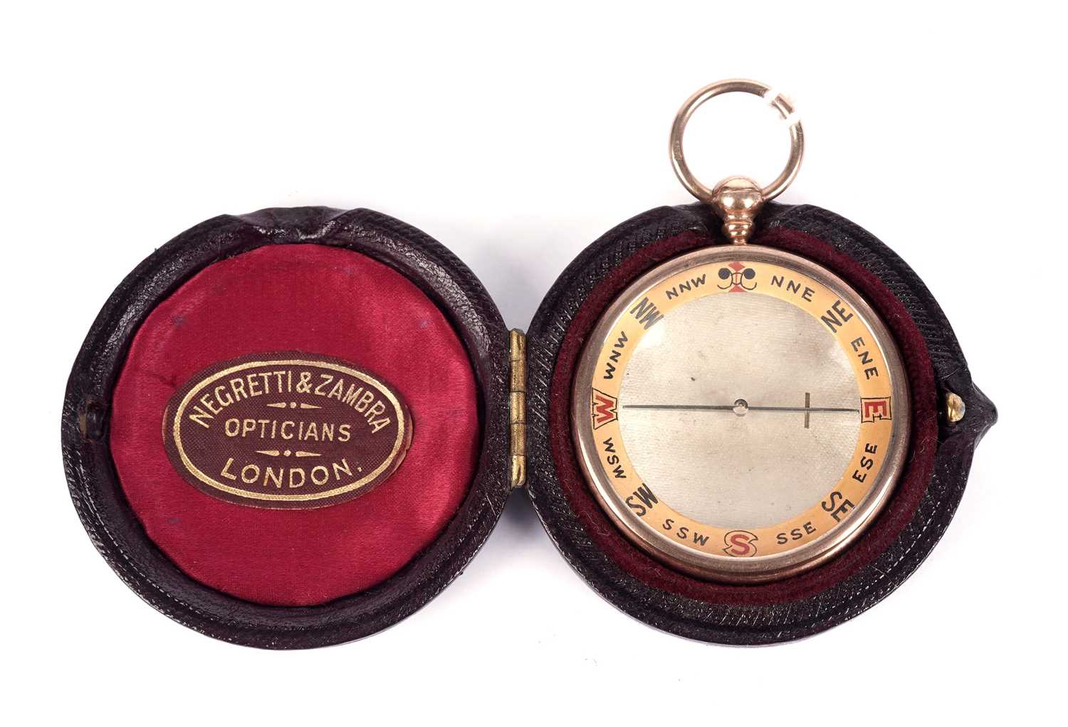 Negretti & Zambra, London (retailer): a 9ct yellow gold mounted compass