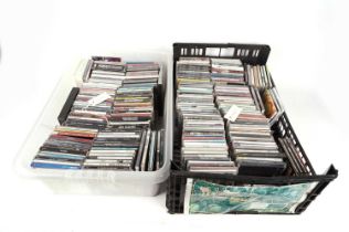Two boxes of mixed CDs