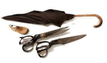 A late Victorian parasol; two pairs of tailor's scissors and a cobblers last