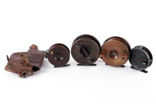 Four vintage fishing reels